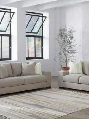 Ensemble de salon moderne comprenant un canapé 3 places et un canapé 2 places en tissu beige, pour un intérieur contemporain et lumineux. Ameublement Hicham.